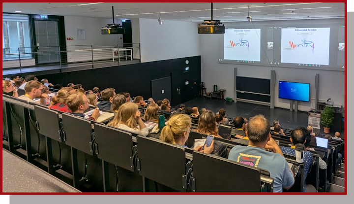 Audience listening to Zoom contribution of N. Dudovich.